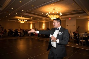 Chicago Magician David Ranalli on Stage performing is corporate magic and comedy