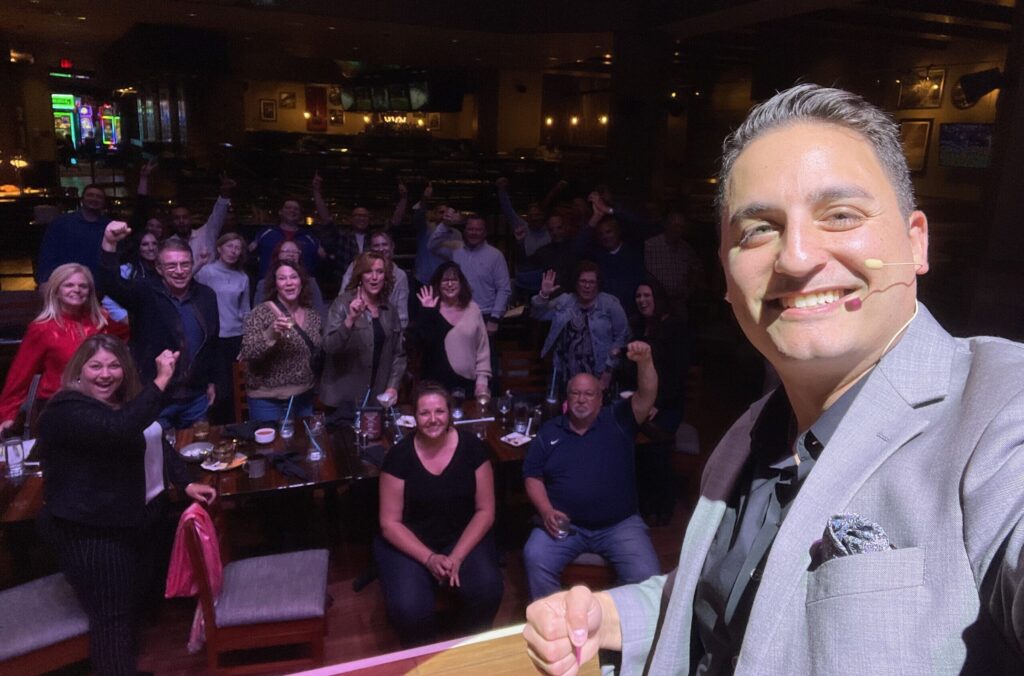 Chicago Magician and Mentalist David Ranalli on stage at a corporate event Chicago Magician and Mentalist David Ranalli on stage at a corporate event